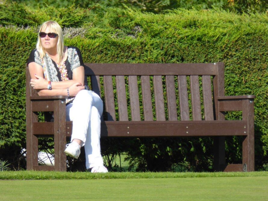 Dale Bench - Bowls Club with lady in sunshine